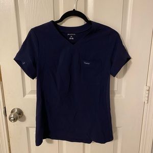 JAANUU 2 pocket tuck in scrub top navy size XS. Worn 2xs, EUC